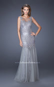Picture of: Long Mermaid Sequin Prom Dress with Sheer Mesh Overlay in Silver, Style: 19485, Main Picture