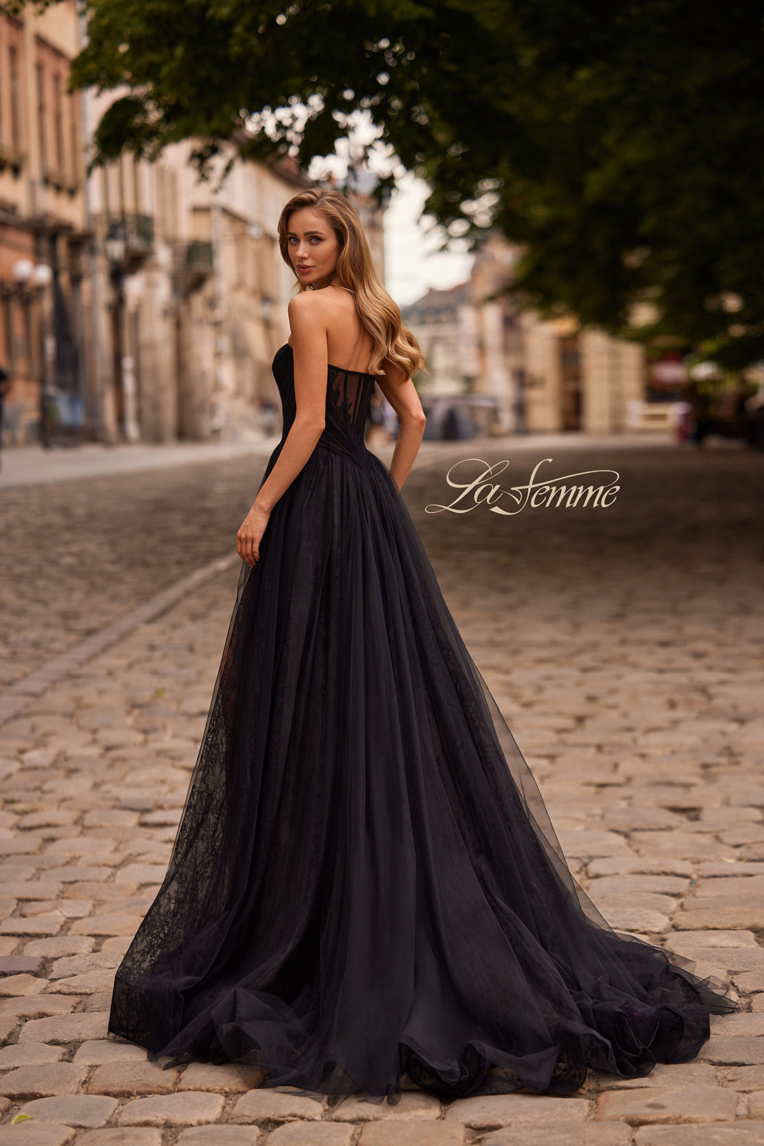 Picture of: Strapless A-Line Gown with Sheer Corset Bodice and High Slit in Black, Style: 33307, Back Picture
